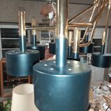 Black chandelier and gilded metal