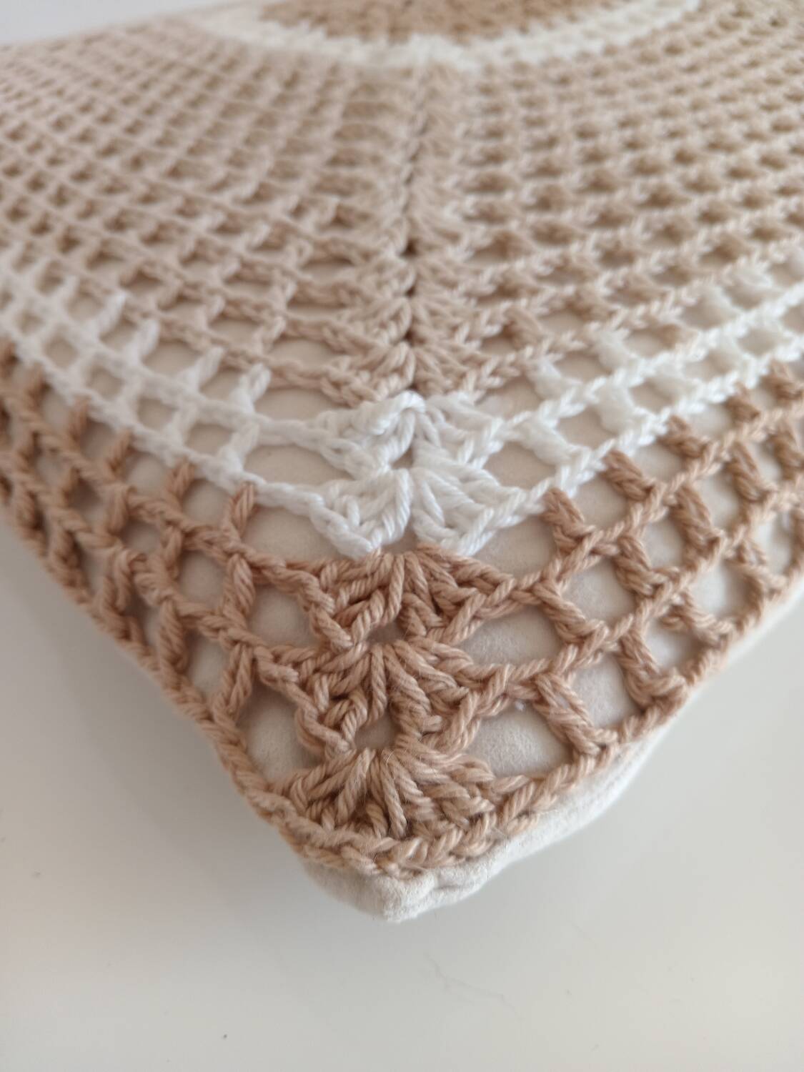 Pair of crocheted cushions