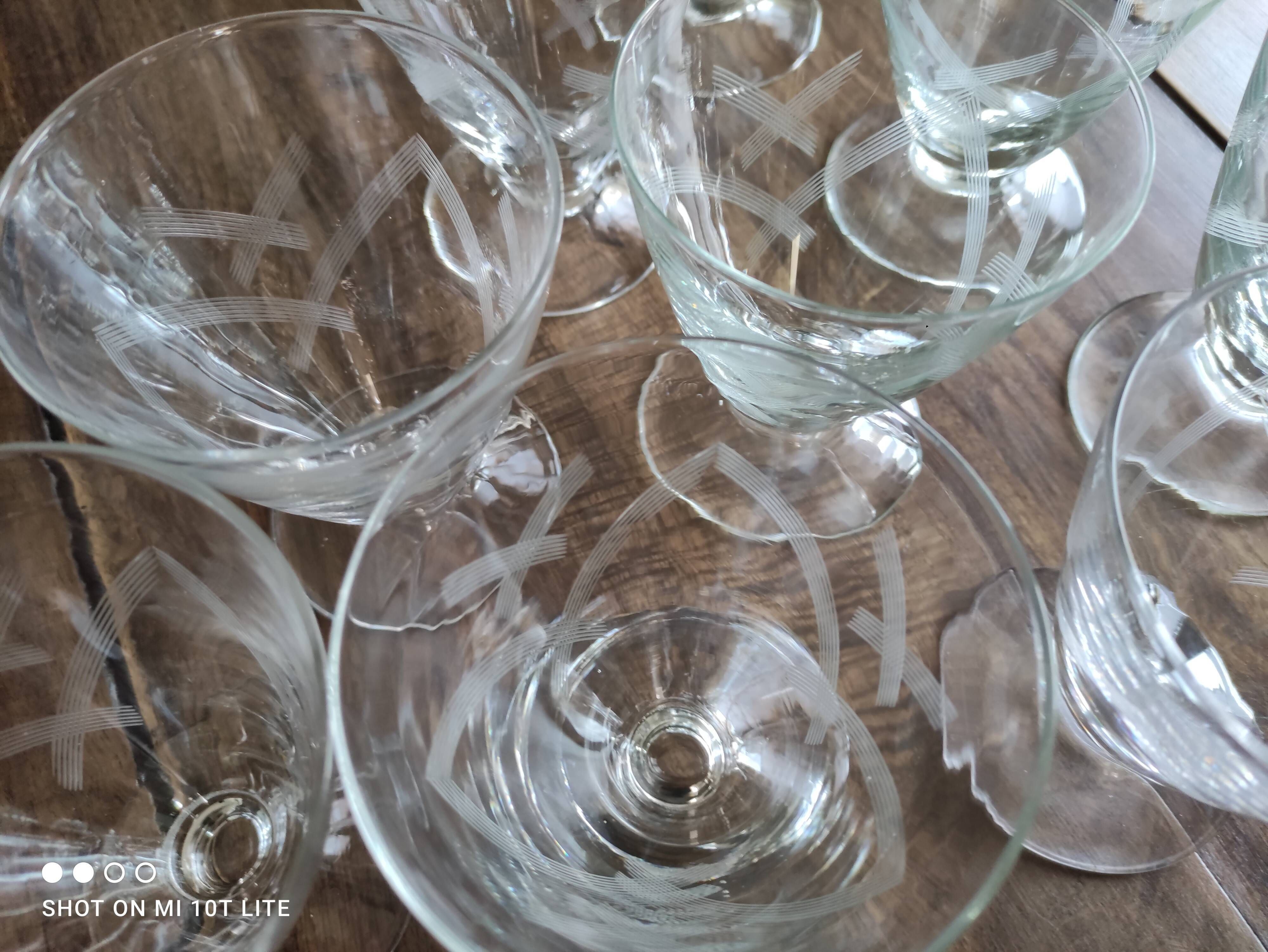 Set of 9 conical glasses on pedestal in antique chiseled glass crosses