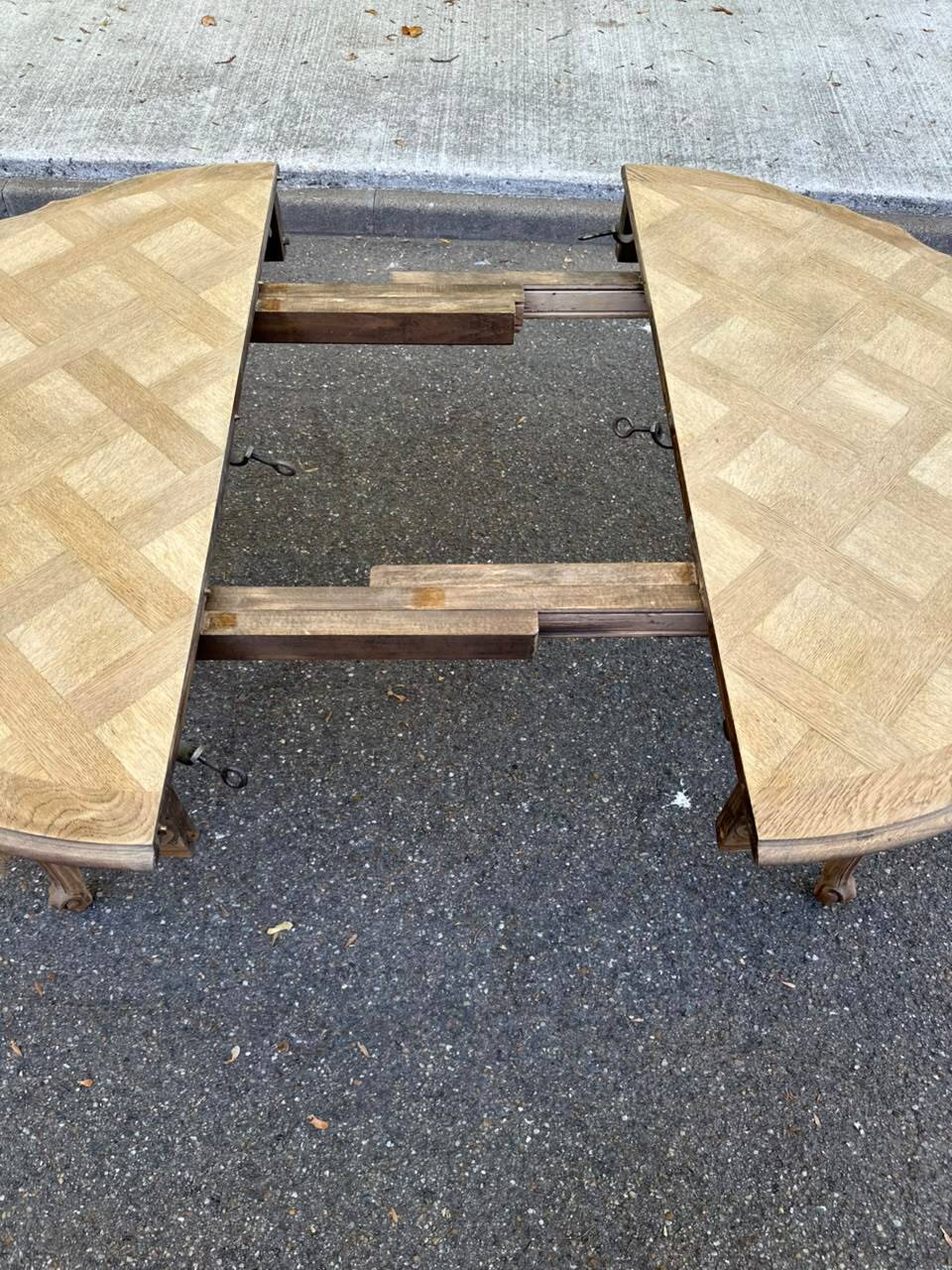Round extendable dining table Louis XV stripped in solid oak 1950