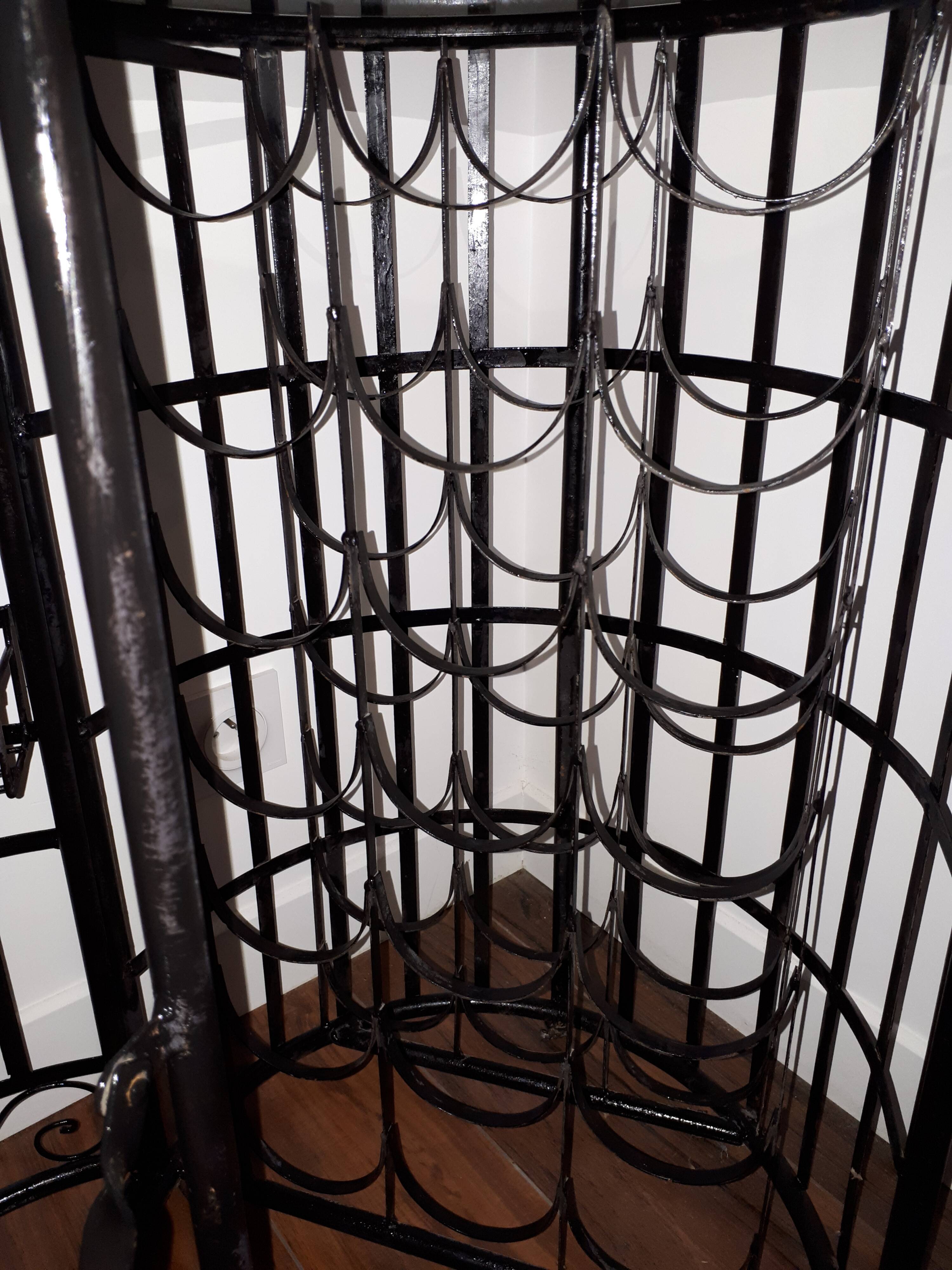 Wrought iron bar with bottles holder