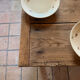 Renovated raw wood farmhouse table