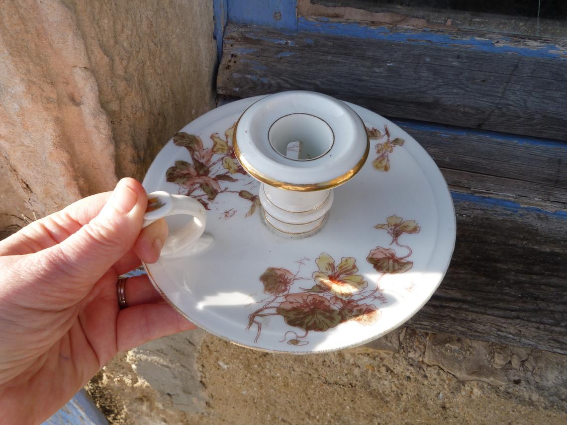 Ancient 1900 porcelain hand-held candlestick