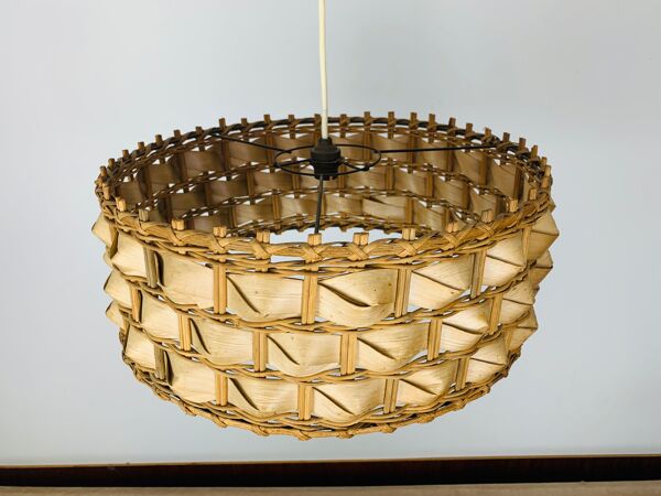 Suspension rotin et feuilles de palme style jungle chic