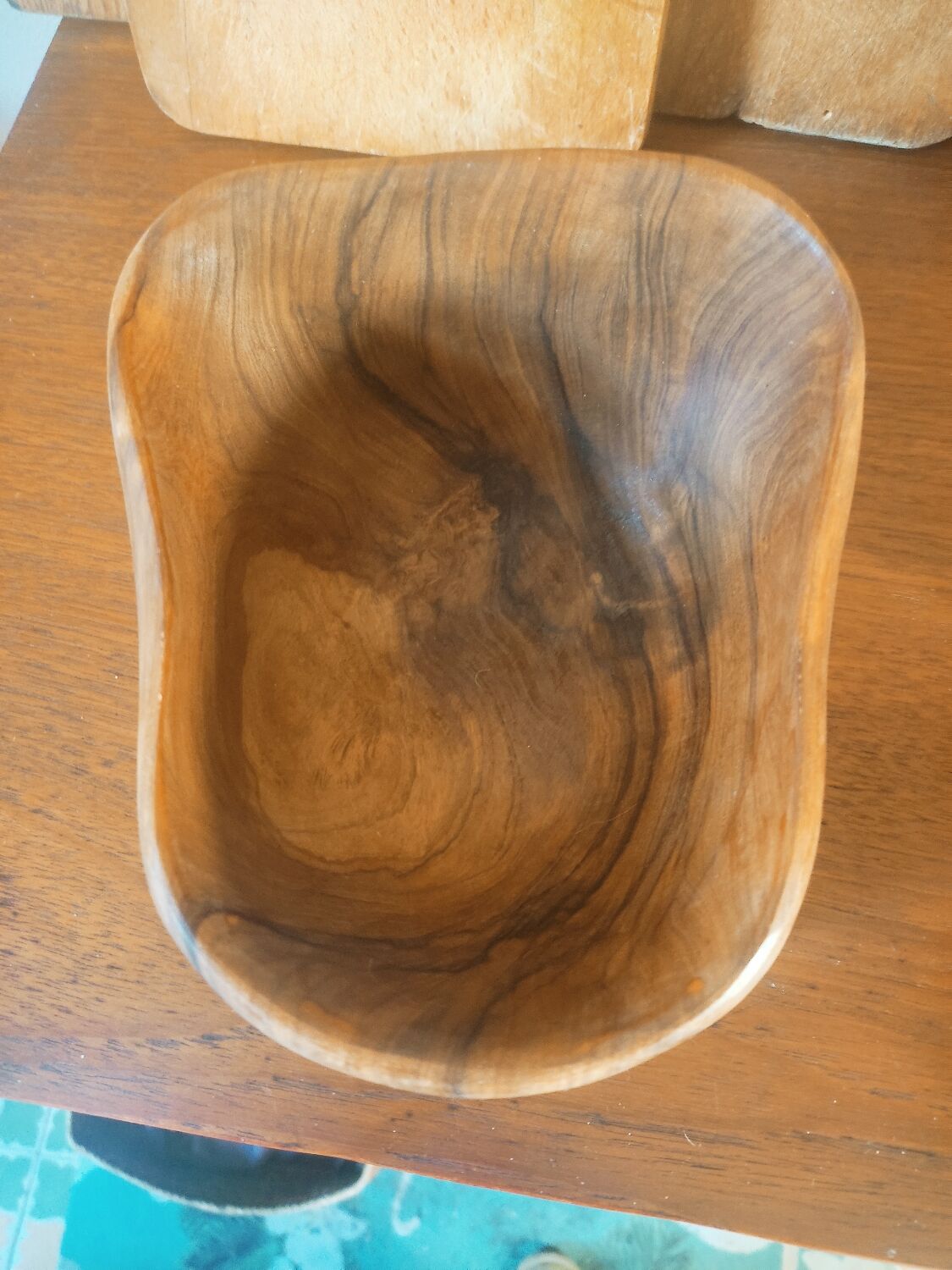 Empty pocket in olive wood