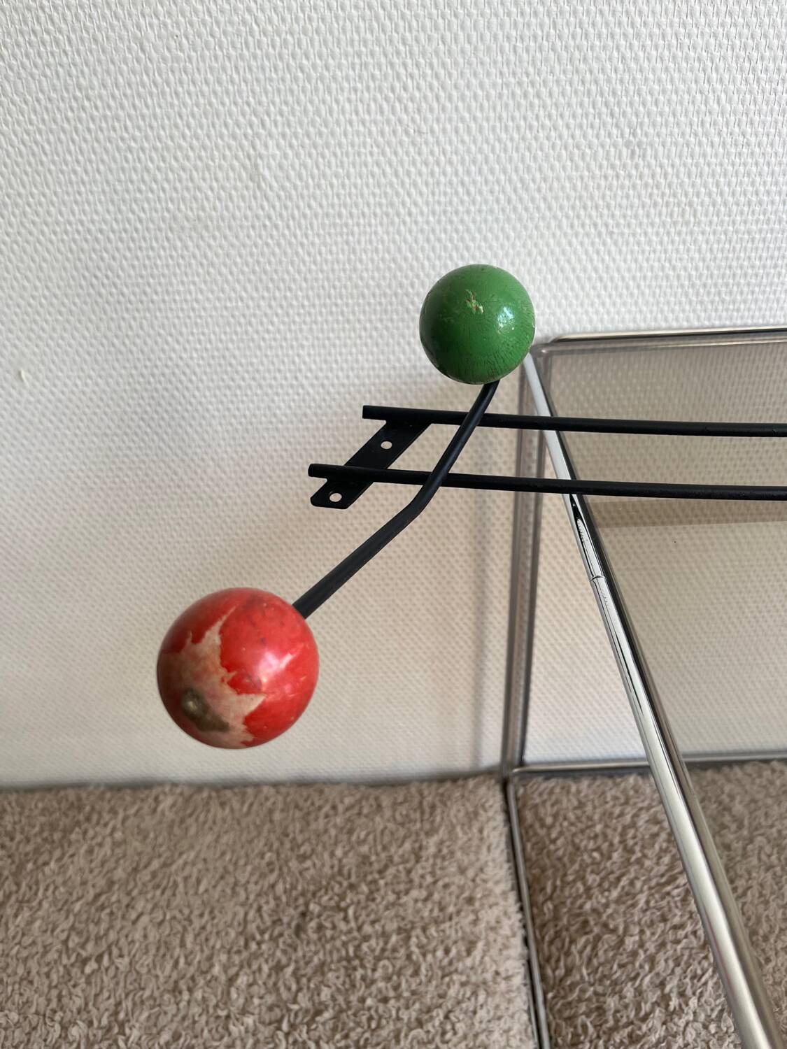 Iron wall coat rack and wooden hooks from the 60s