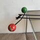Iron wall coat rack and wooden hooks from the 60s