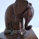 Pair of stylized elephant bookends in solid wood