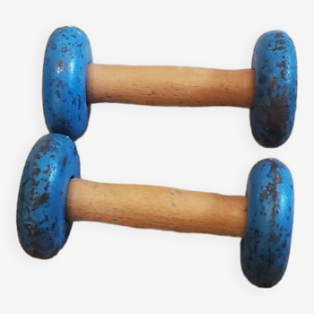 Pair of wooden and cast iron dumbbells from the 50s and 60s