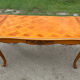 Antique extendable table in cherry wood and marquetry in the Louis XV style.