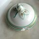 Porcelain cream service of Paris 1850, 6 pots on green and gold oval tray