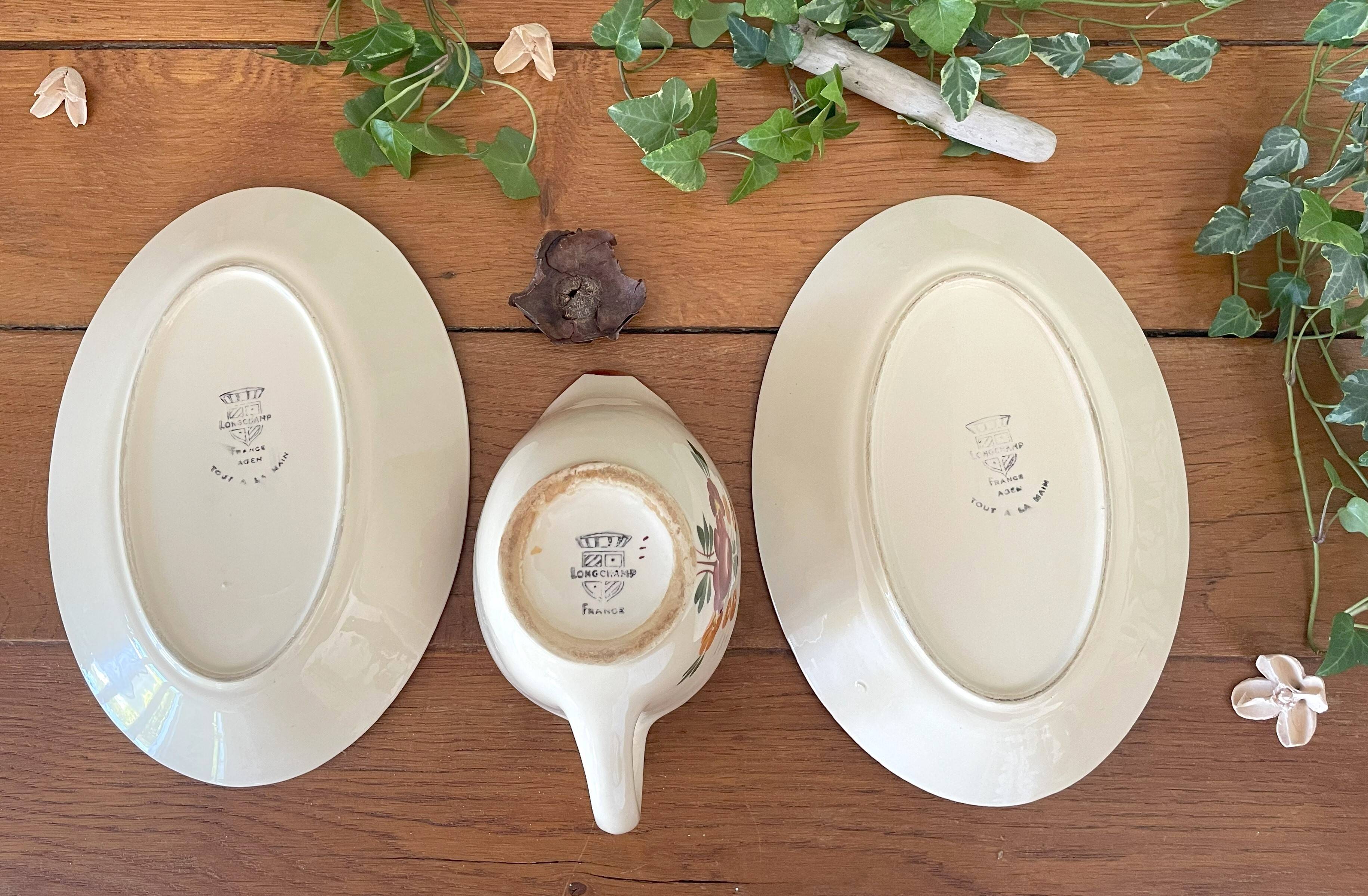 Pair of antique Longchamp earthenware raviers and sauceboats