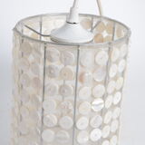 Suspension in mother-of-pearl buttons