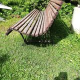 Old wooden bench and wrought iron