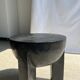 Black mango wood tripod side table with a semi-spherical top, height: 45 cm, diameter: 44 cm.