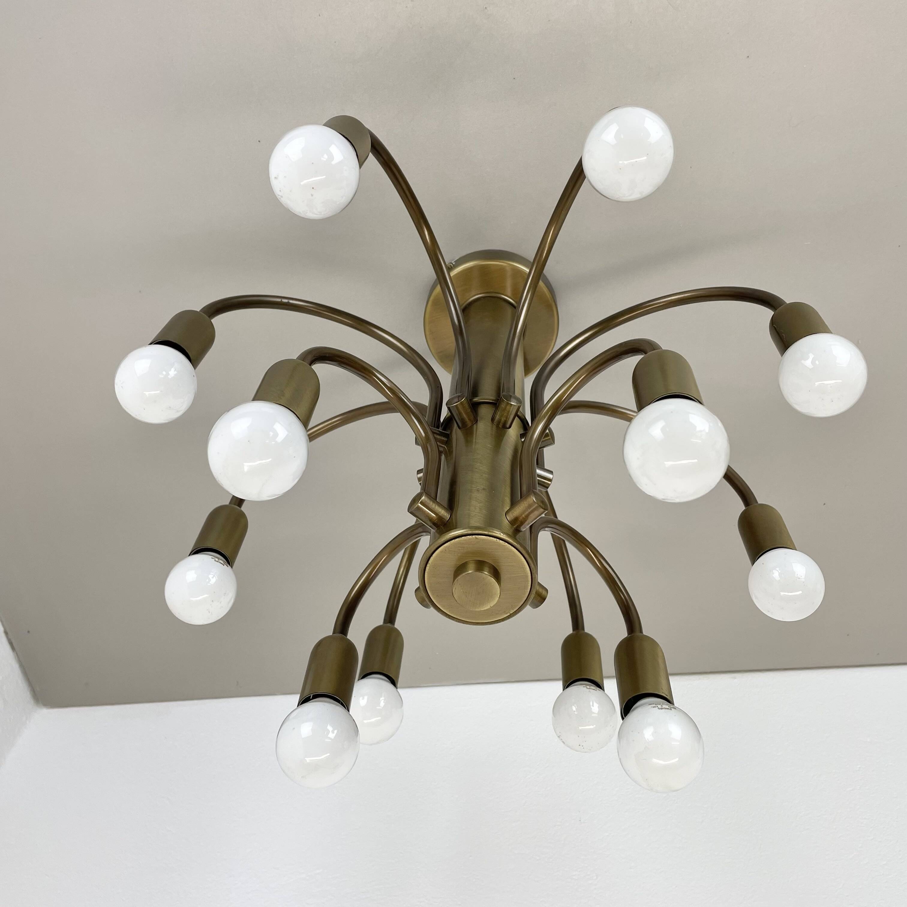 large 12-armed solid Brass ceiling light Chandelier by WKR Lights, Germany 1970s