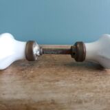 White porcelain door knob handles
