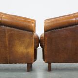 Set of 2 sheep leather club chairs in a cognac color