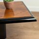 Vintage coffee table – wood burl and black lacquer, in the style of Ma.