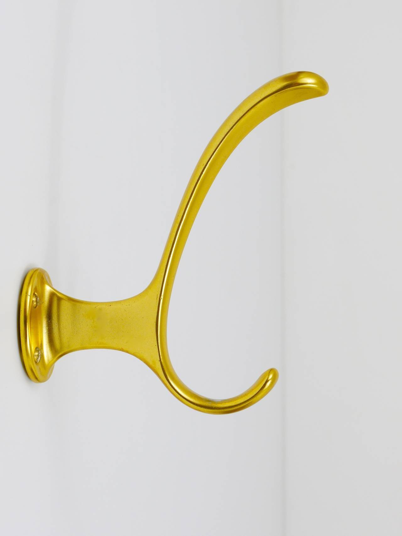 Set of four mid-century golden wall hooks, Austria, Vienna, 1950s.