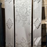 Wall decoration in three pieces, triptych of relief decoration on weathered wood, white and gold,