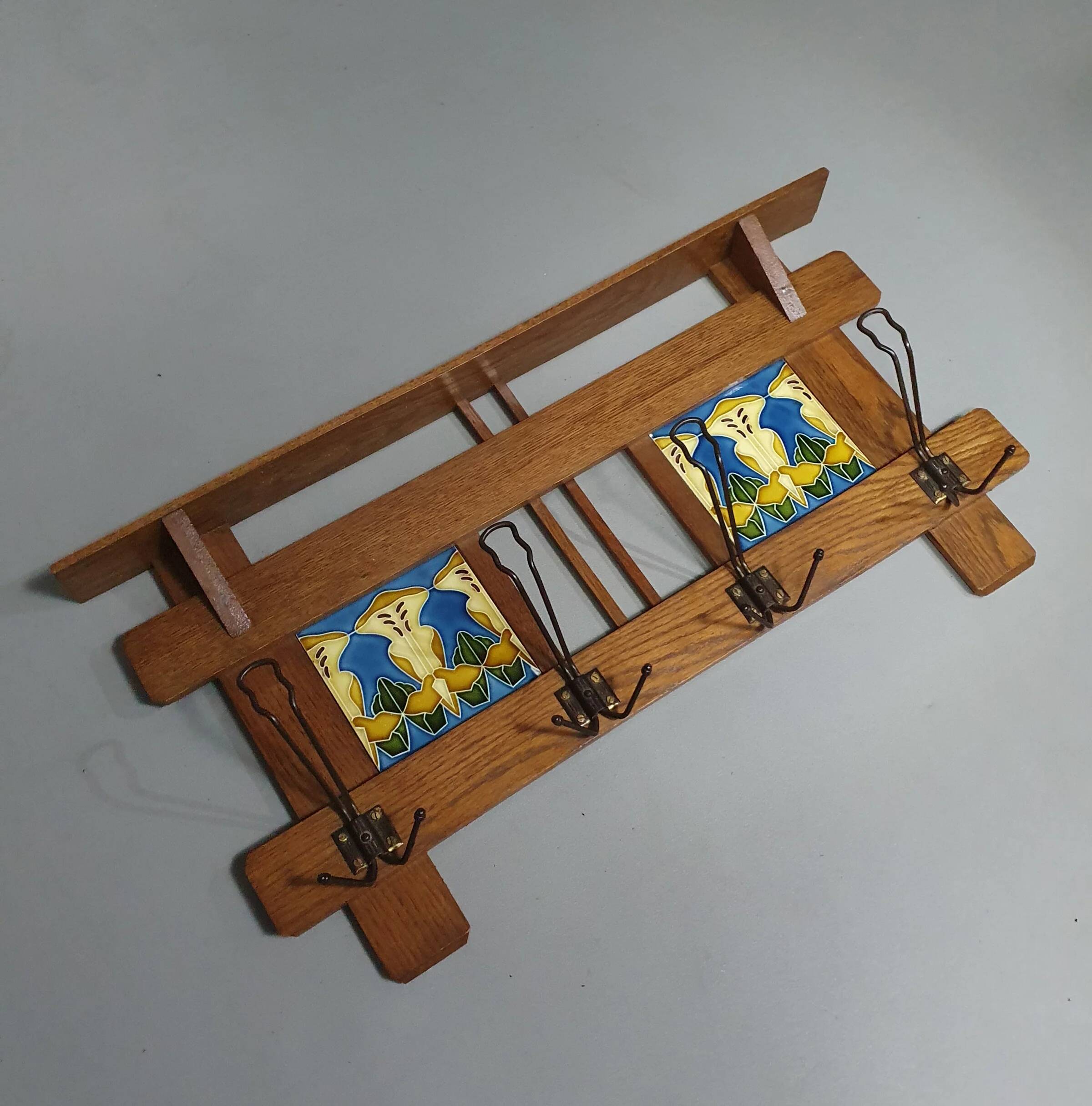 Art Nouveau wall coat rack with tiles
