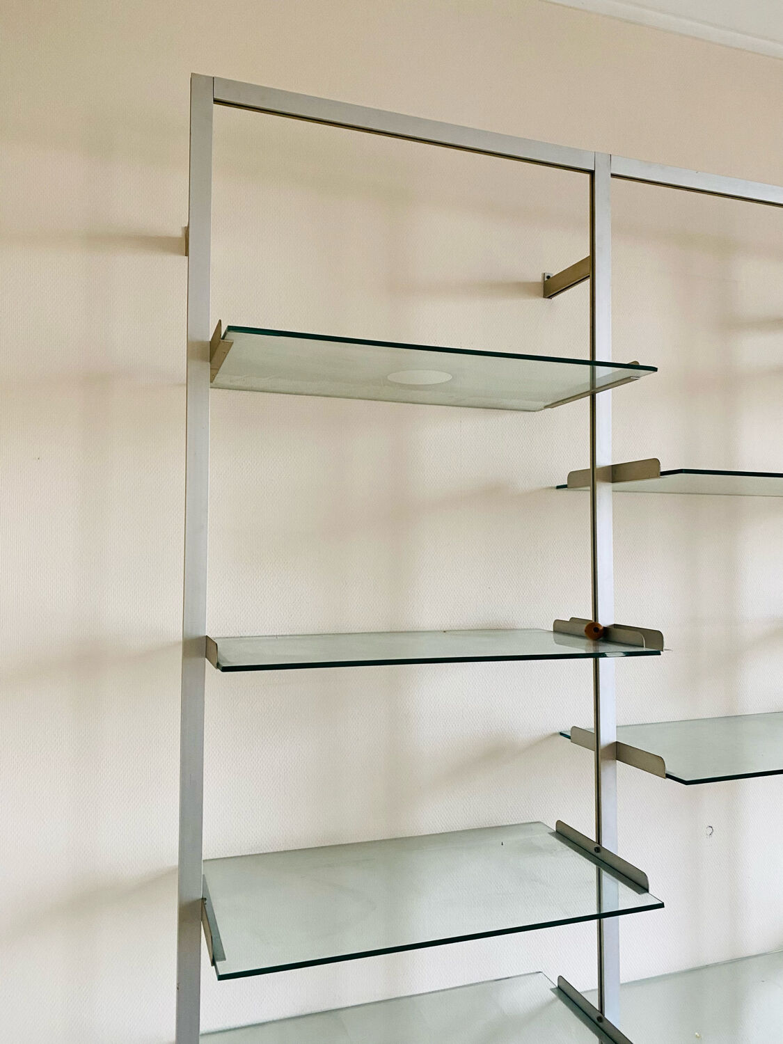 Wall-mounted bookcase circa 70