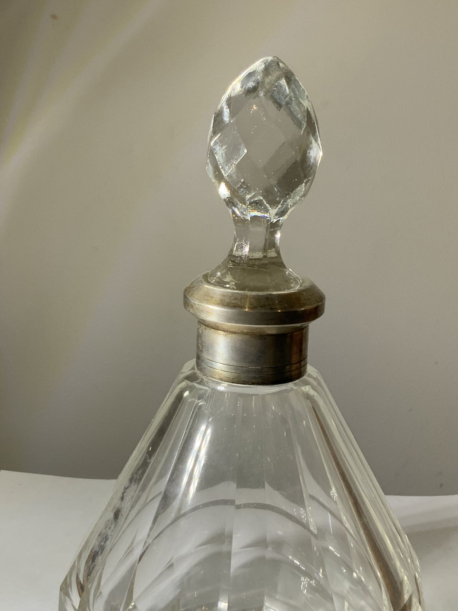 Antique crystal bottle with art deco hallmarked silver neck with facets