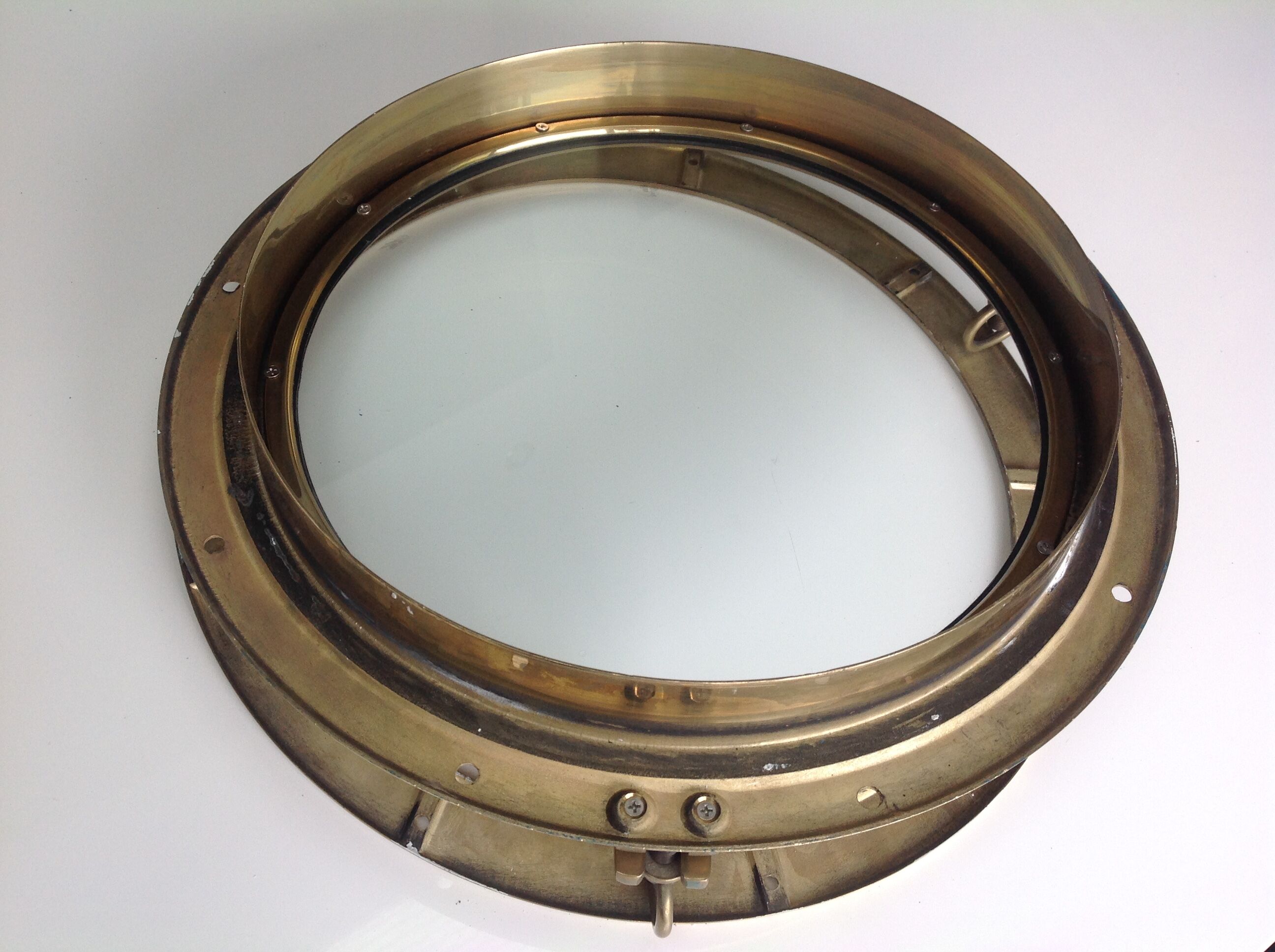 Brass opening partition window