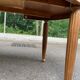 Large stripped solid oak dining table in Louis XVI style with 3 extensions.