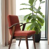 Vintage orange curly papaya armchair 1970
