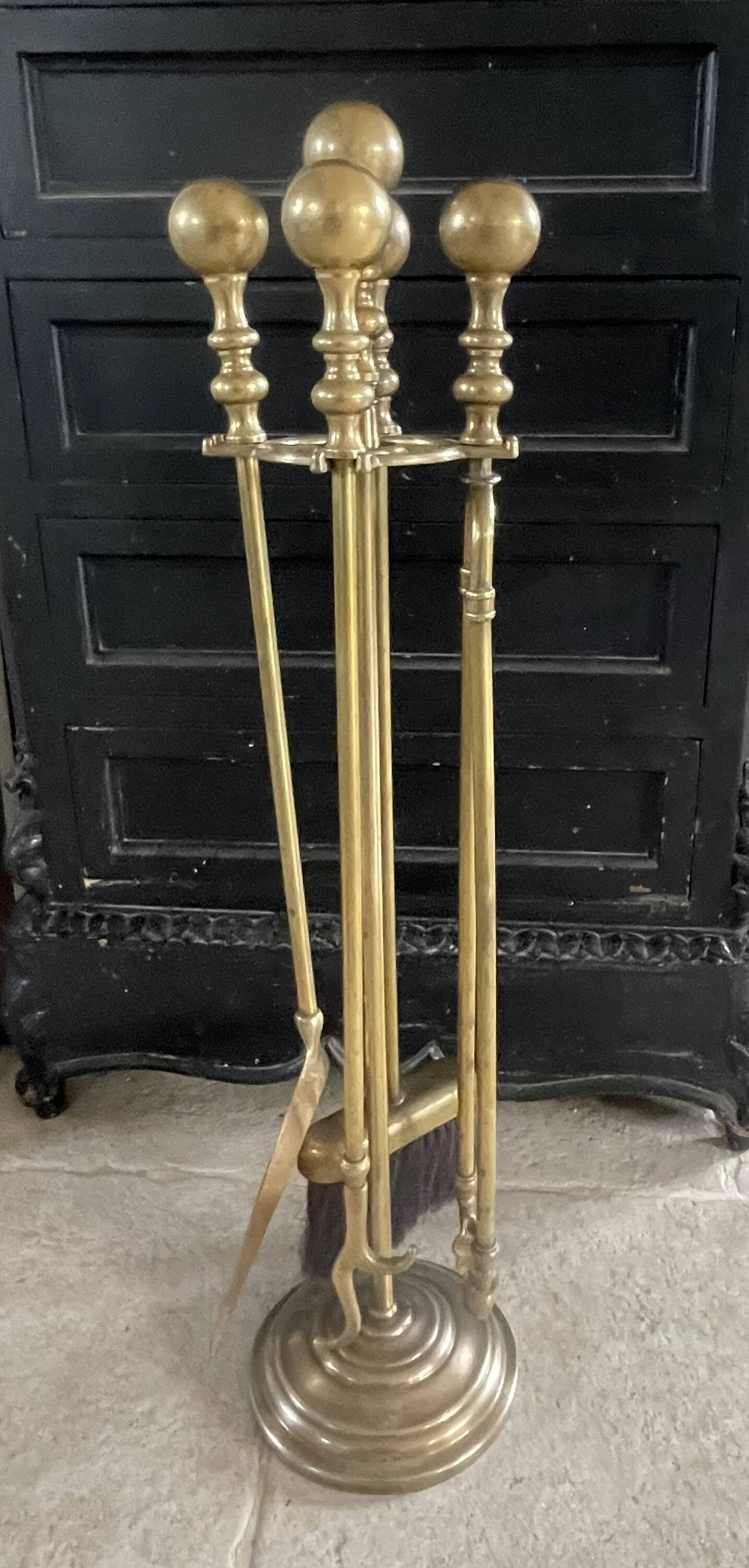Brass fireplace accessory set with vintage stand