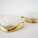 Pair of glass and gold metal shell sconces