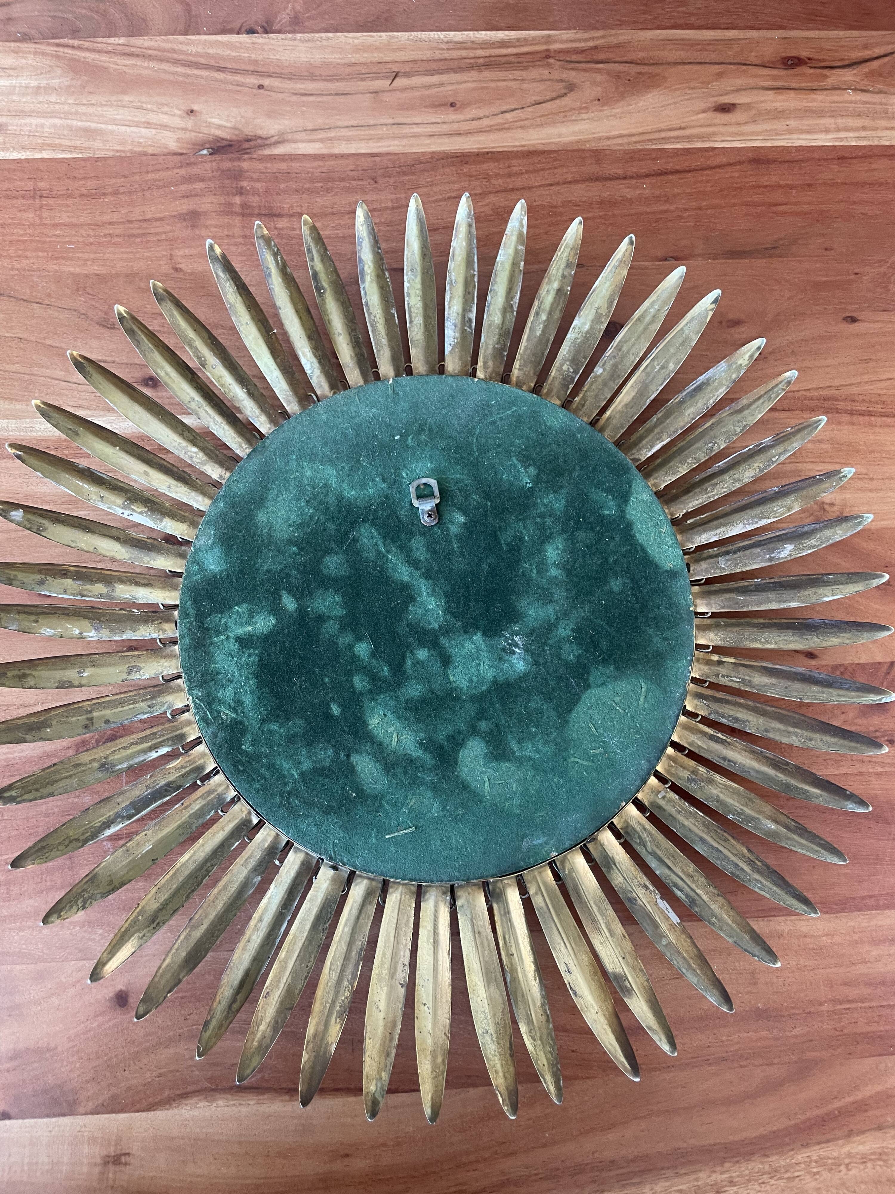 Deknudt convex sun mirror in metal, 70s