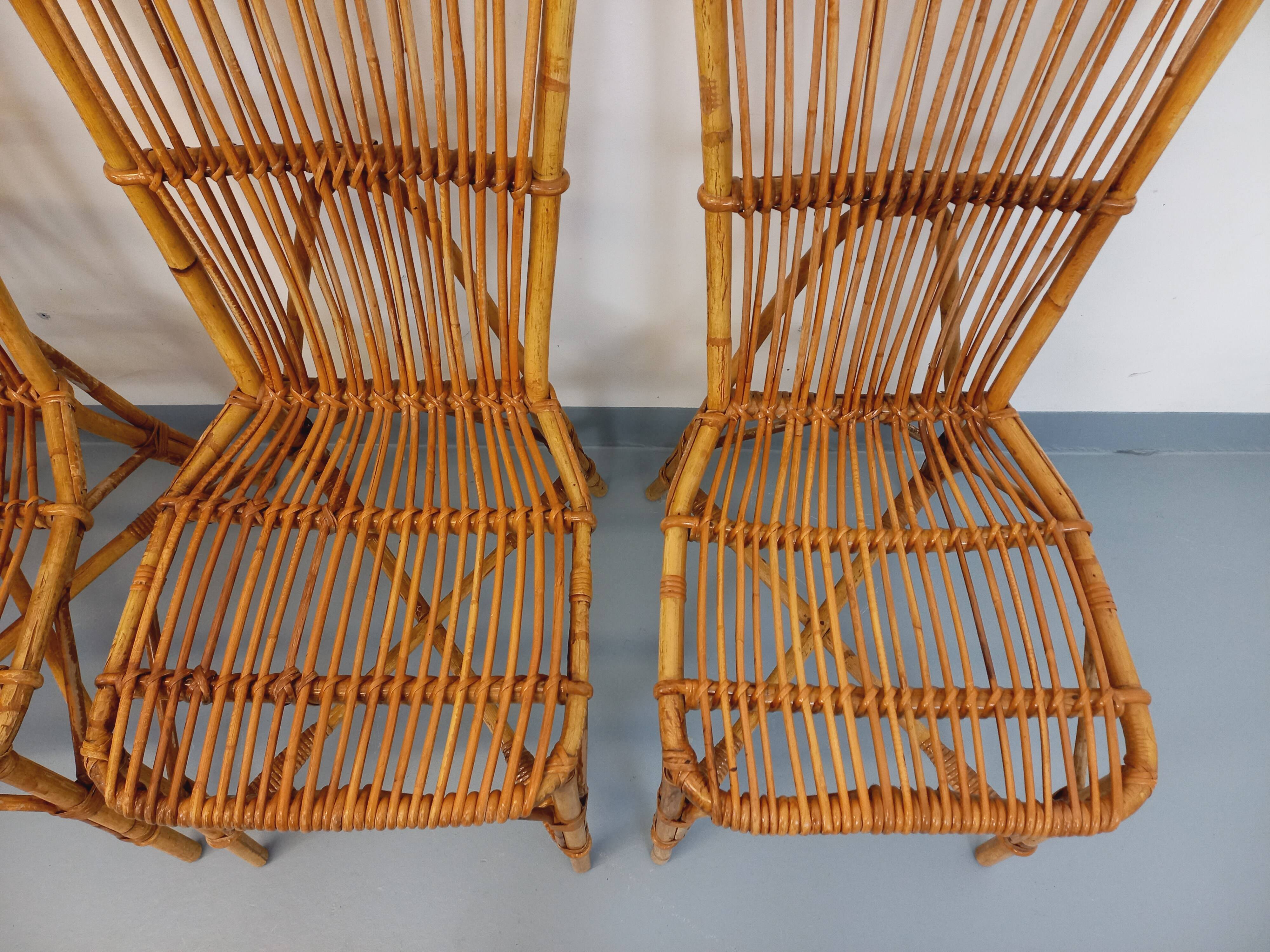 Set of 4 vintage Audoux Minet rattan chairs from the 1950s and 60s.
