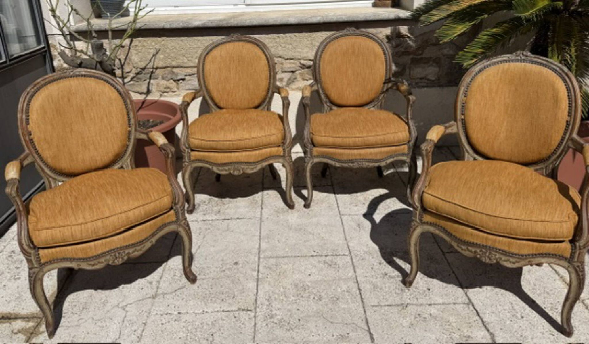 Set of four cabriolet armchairs from the late 19th century in Louis XV style.