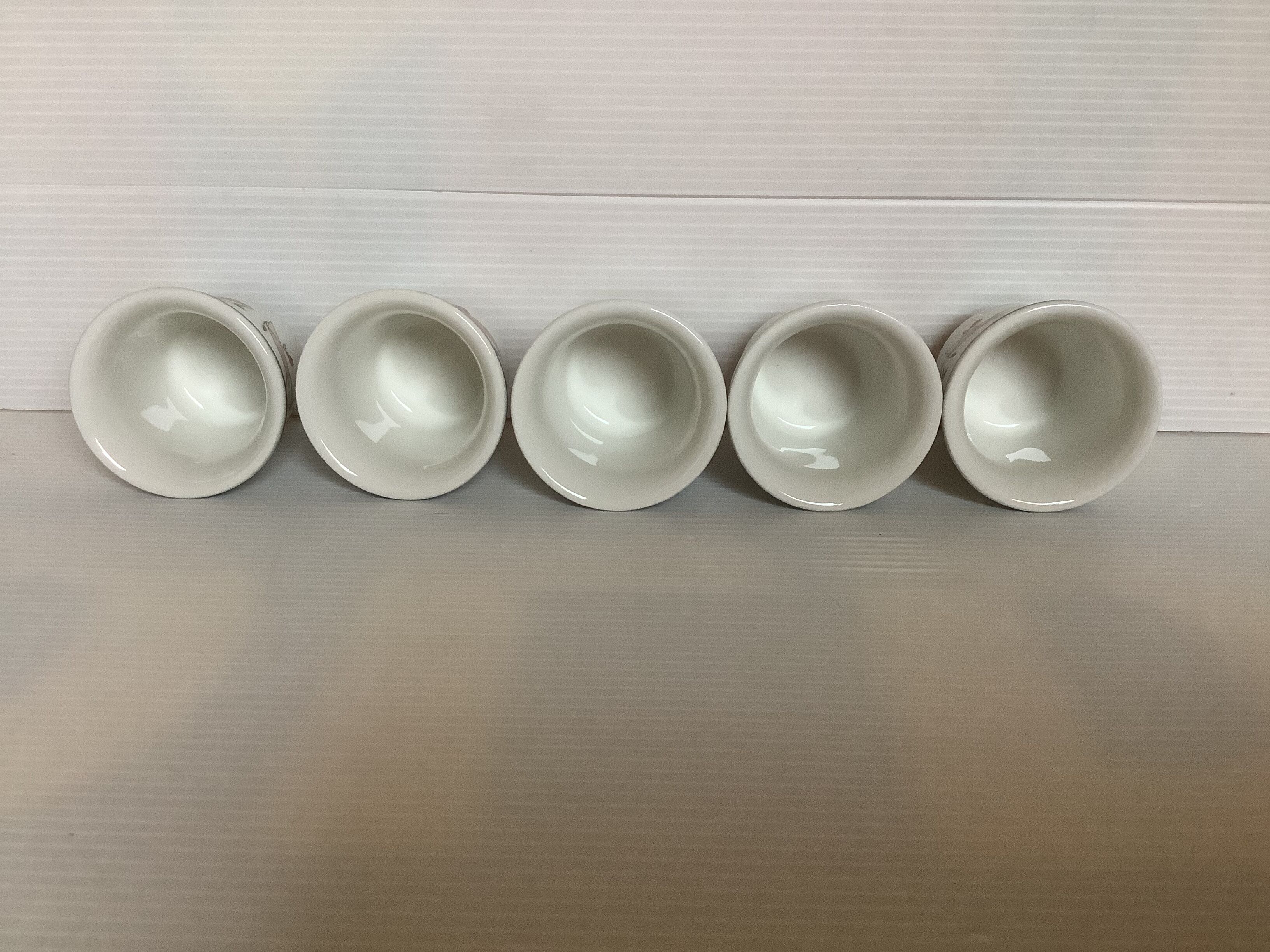 5 pink flower egg cups made in England