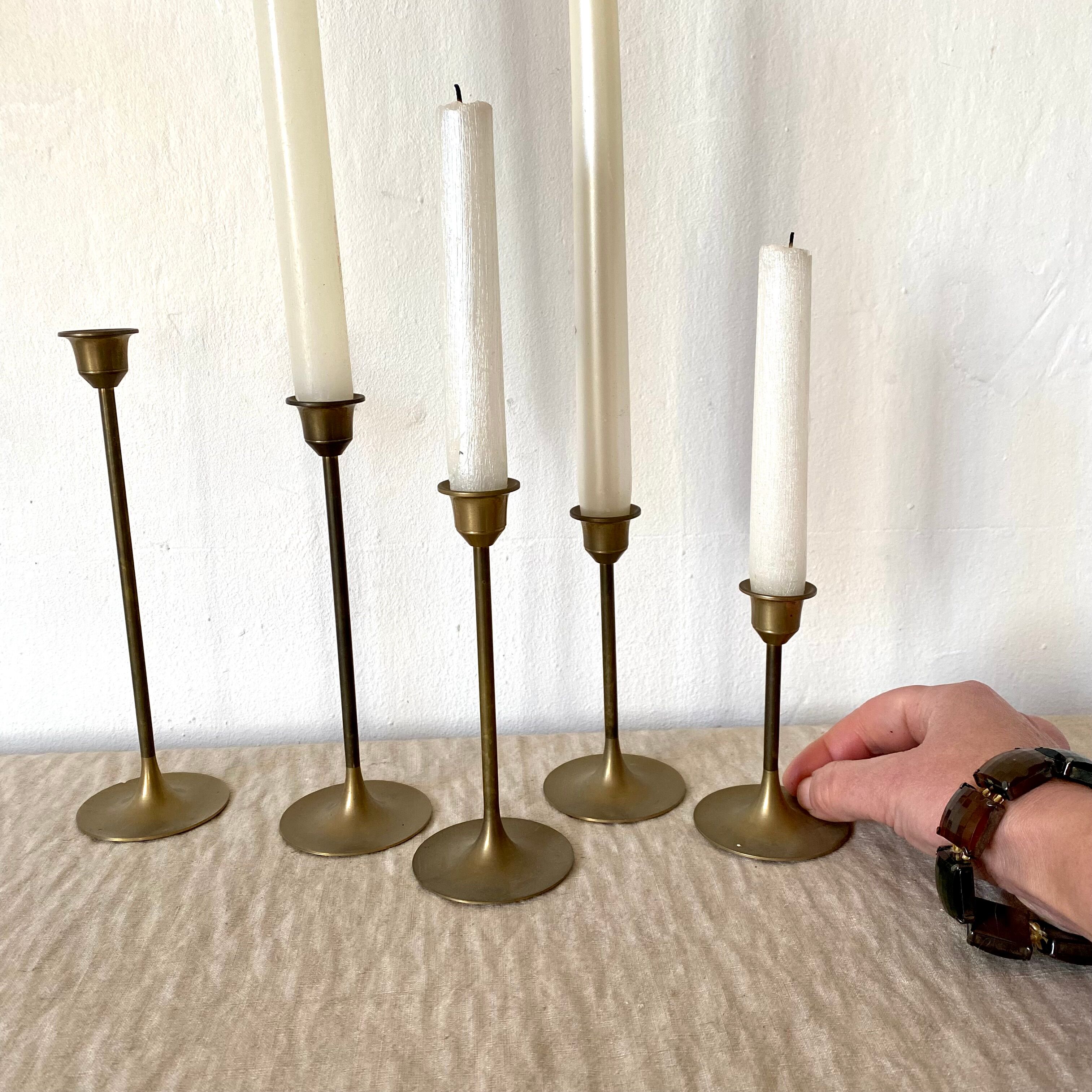 Series of brass candle holders