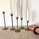 Series of brass candle holders