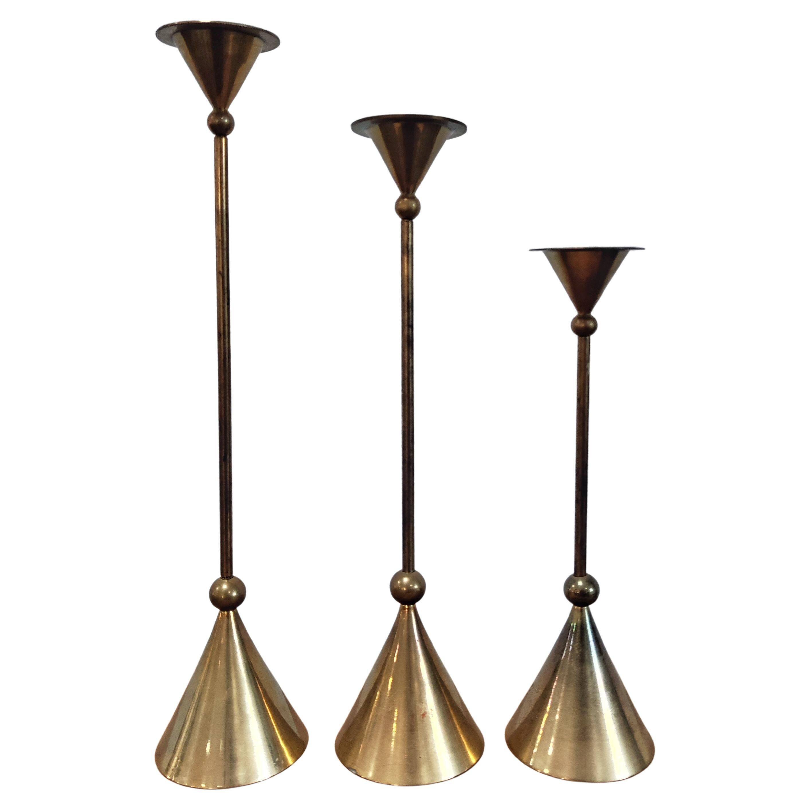 Set of three bronze candlesticks by Christian de Beaumont from the 1980s.