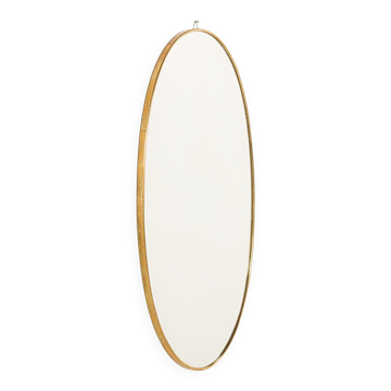 Miroir italien des années 50 dans un cadre en laiton.