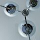 Lampe art déco en argent avec trois abat-jours en forme de sphère