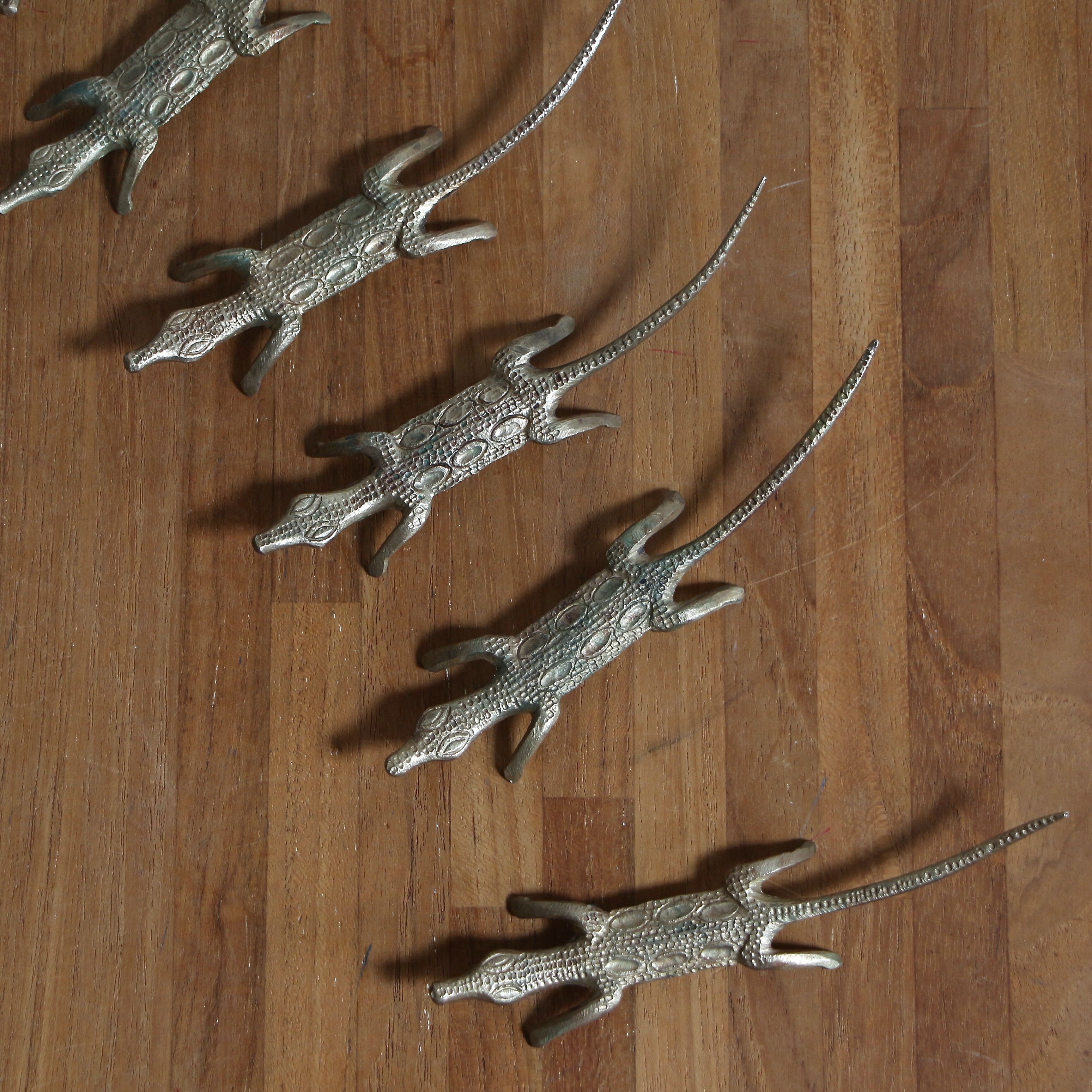 Brass crocodile knife holder