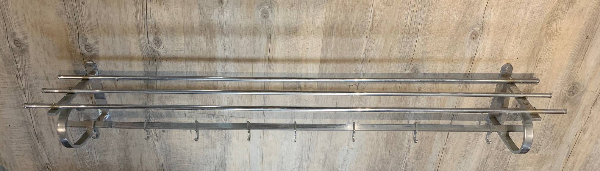 Large chrome metal wall coat rack with Art Deco shelf