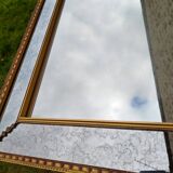 Mirror with glazing bead