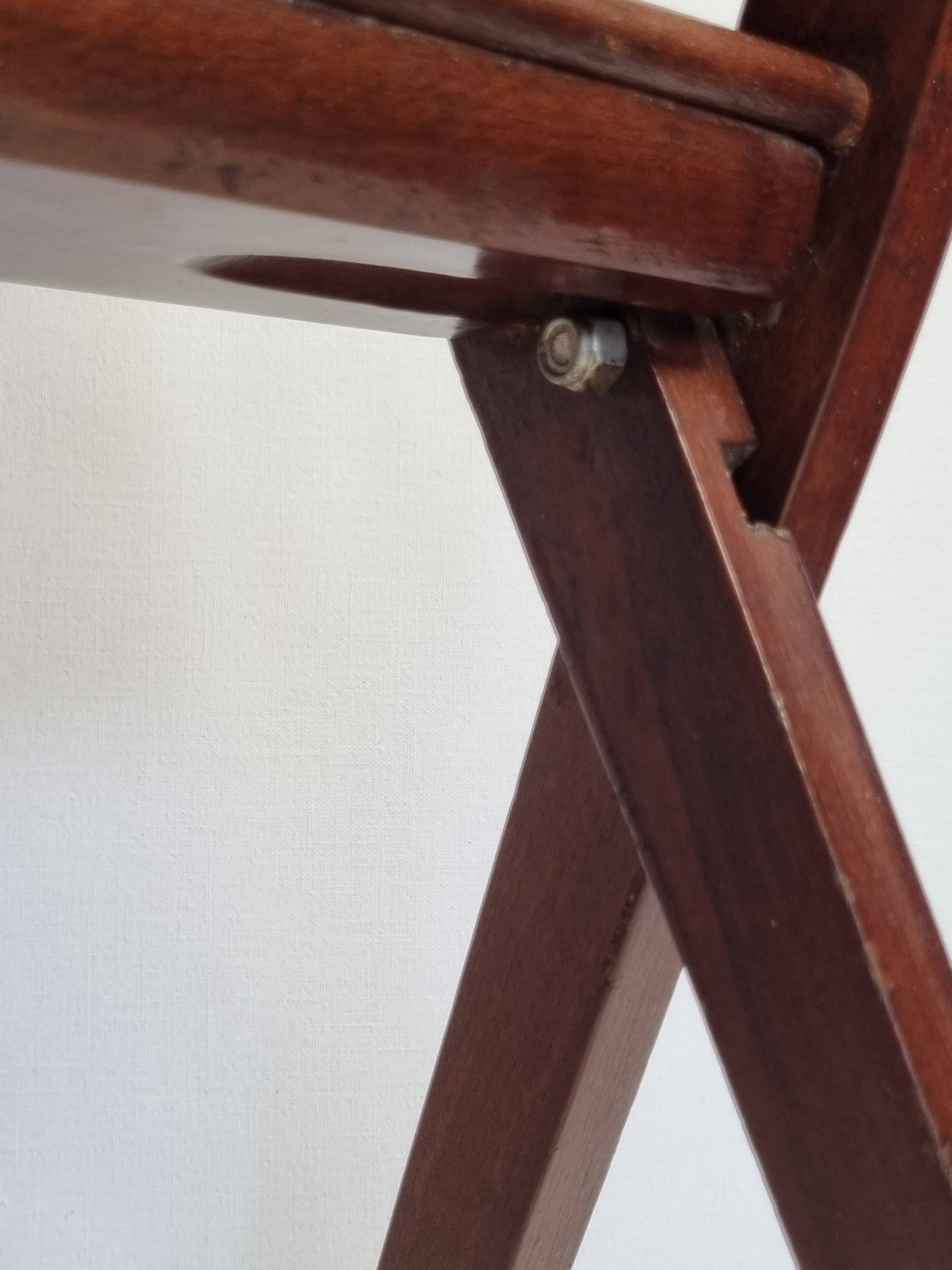Folding teak magazine holder by Cees Braakman