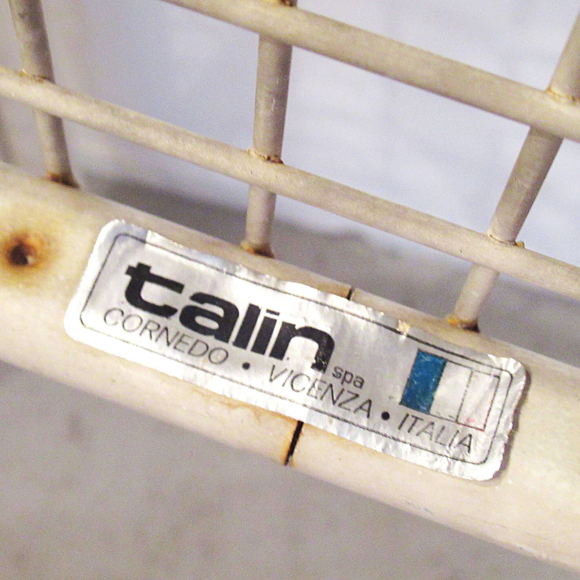 Four Talin Spa metal mesh chairs from the 1980s.