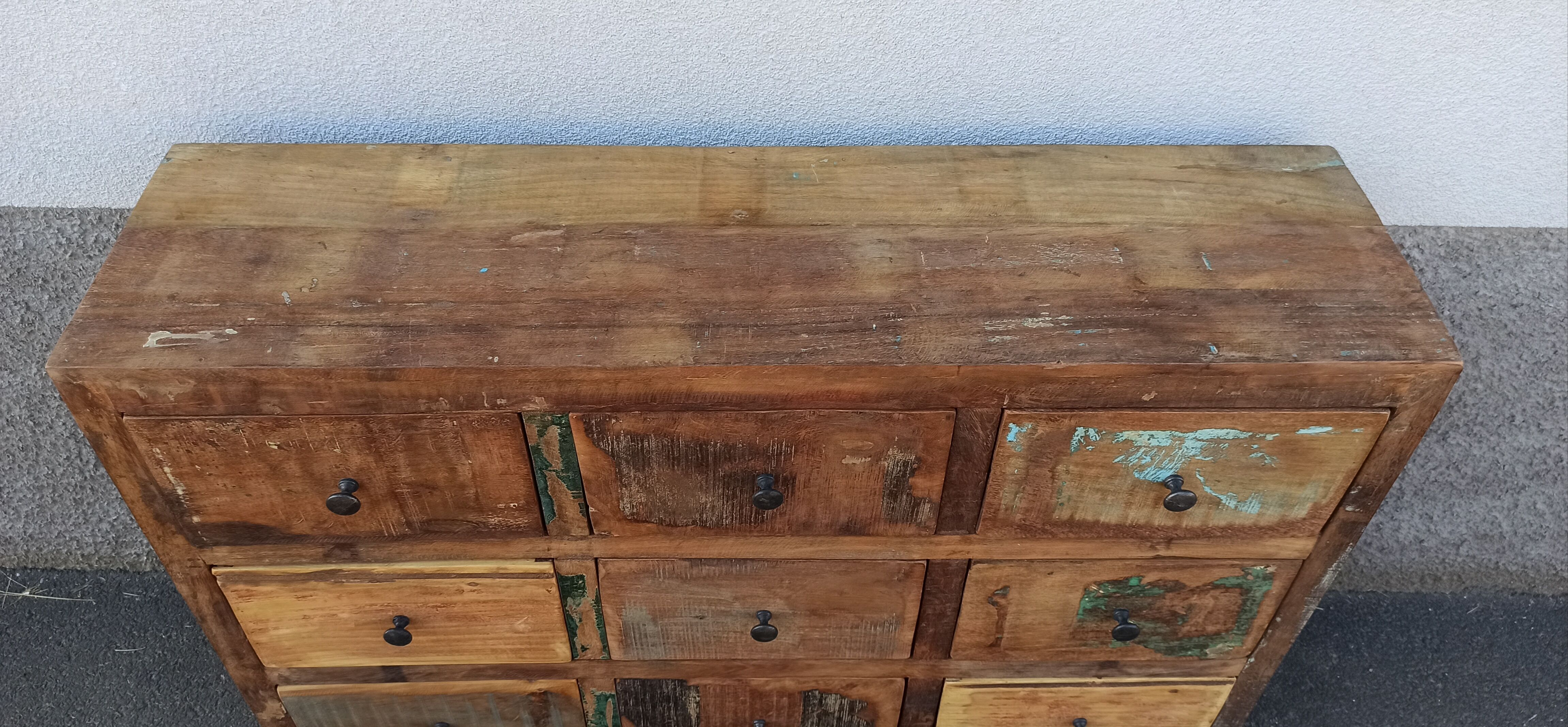 Commode en bois 9 tiroirs