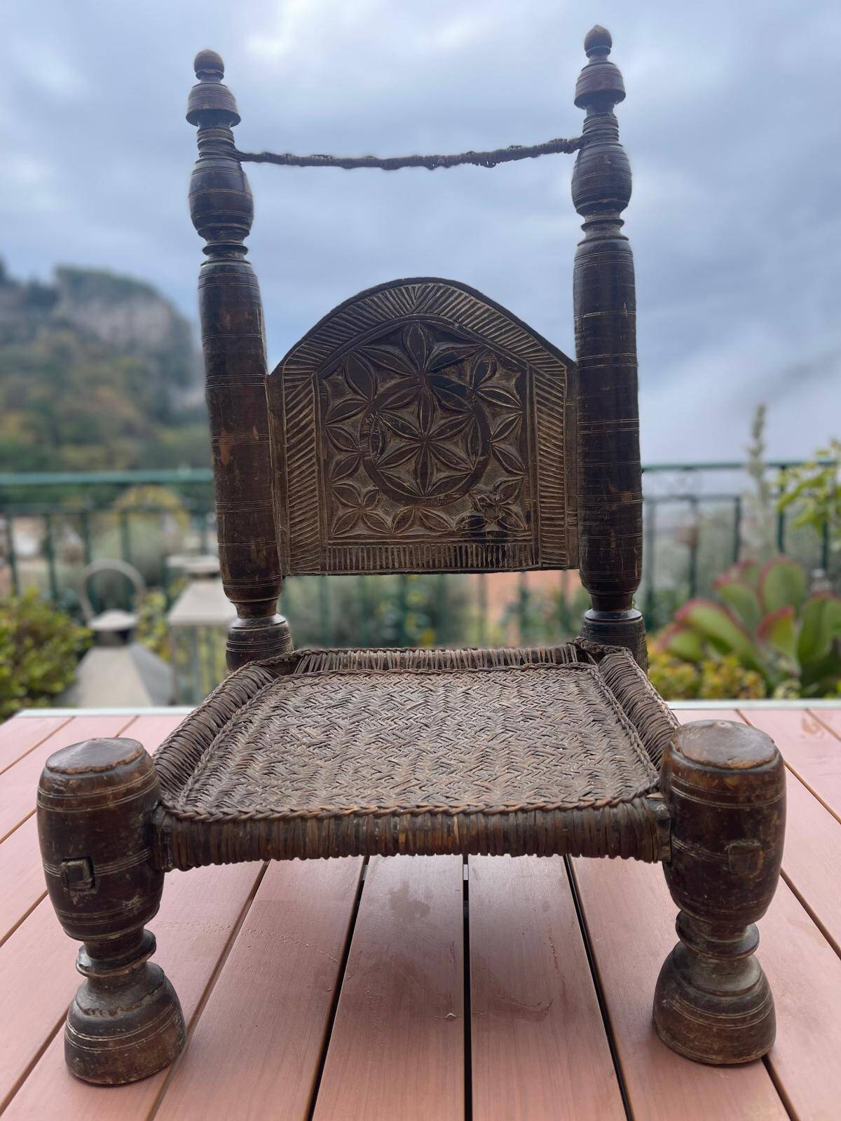 Pair of antique traditional Indian carved wooden chairs