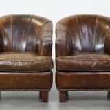 Set of 2 sturdy design armchairs made of cowhide with a beautiful deep color